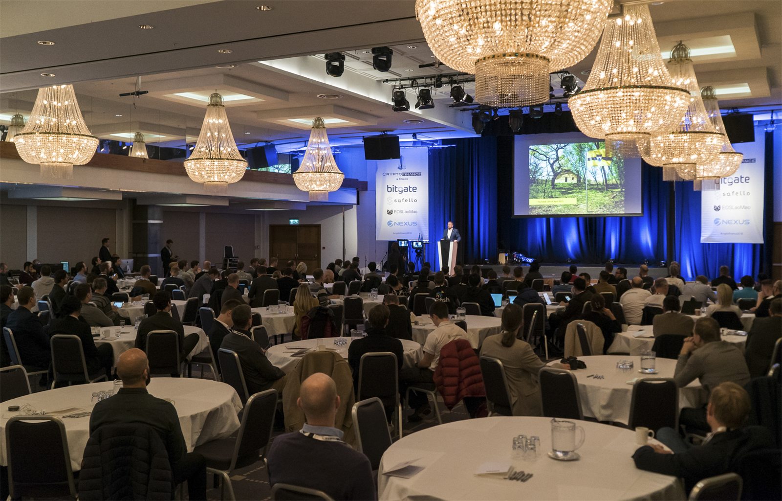 Audience and stage in the main hall at CryptoFinance 2018